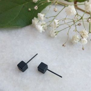 Black square studs